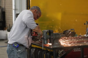 Volunteer welding at Champaign Aviation Museum